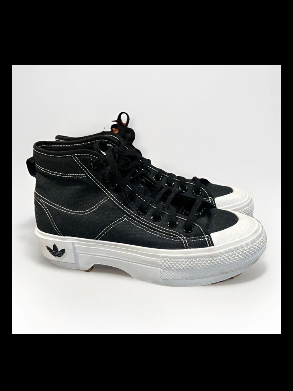 Woman’s Adidas Black High-Top Canvas Platform Sneakers